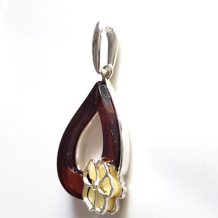 cherry amber leaf with butterscotch amber flower pendant