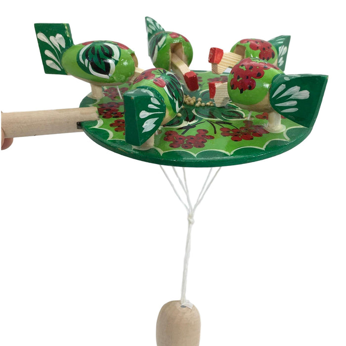 Chicken pecking paddle green