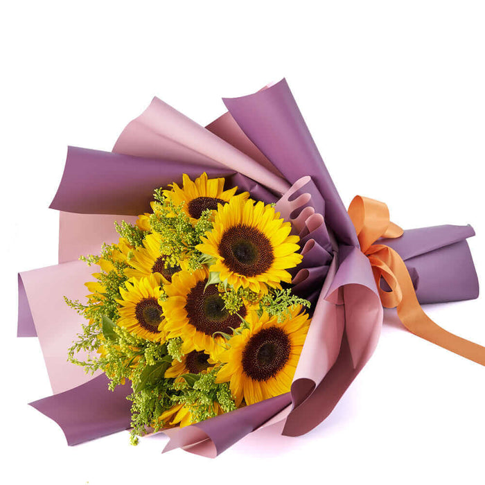 Packed with vibrancy and cheer, this warm yellow bouquet is sure to bring the much-needed dose of positivity into anyone's day.