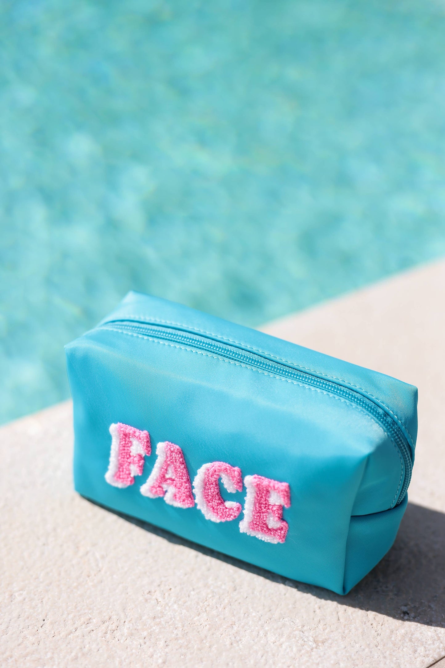 "FACE" SMALL ZIP POUCH
