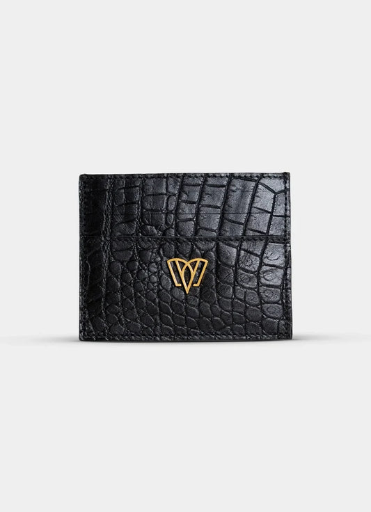 Black crocodile-patterned wallet with a gold logo on a light gray background