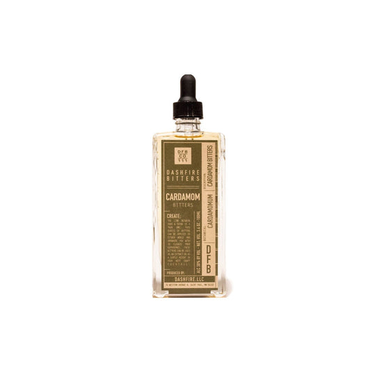 Bottle of cardamom bitters on a white background