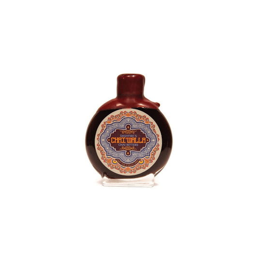 bottle of chai bitters on a white background