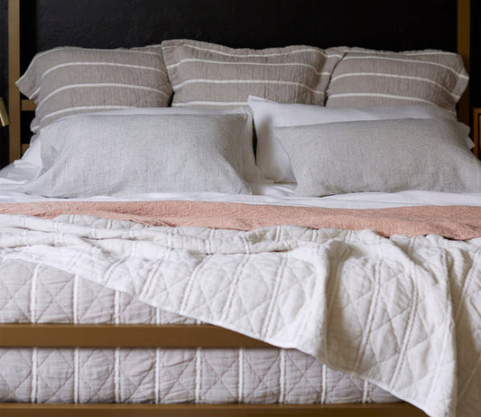 Dr. Weil Heritage Pillow Sham by Dr. Weil by PureCare, shown on bed