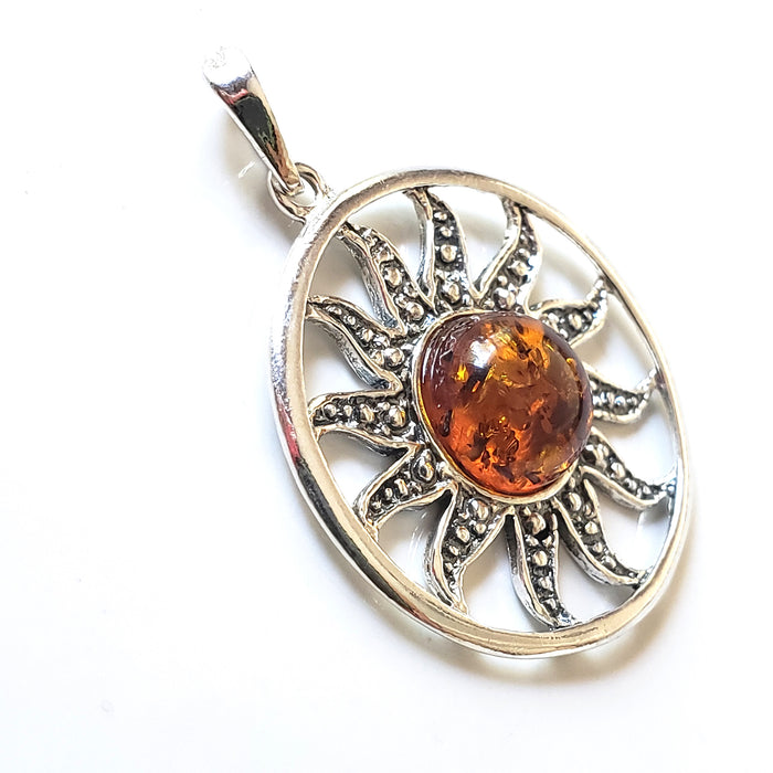 Authentic Russian amber sun pendant