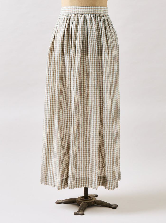 Farmhouse Gingham Homestead Apron — Blue Spruce apron on a dress form; Farmhouse Pottery
