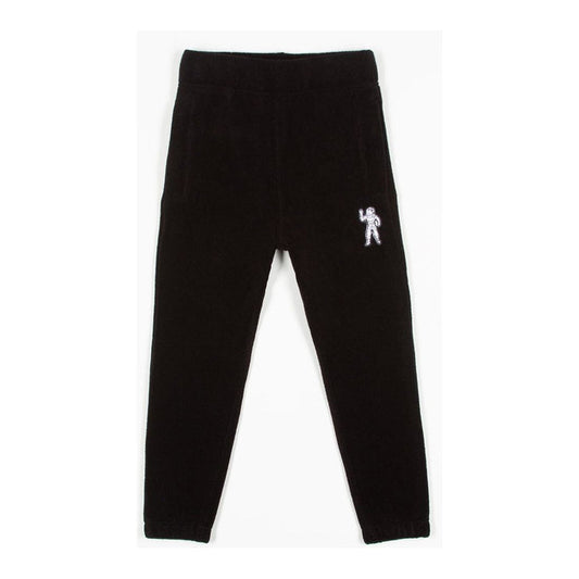 Two young kids wearing the Kids BBC Black BB Naut Pants (833-8102) while playing at the beach on a sunny day, the pants are durable and comfortable for active play and made with high-quality material