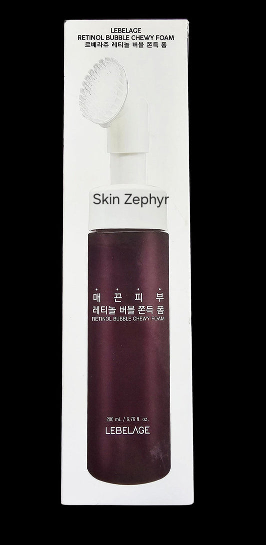 Skin Zephyr Lebelage Retinol Chewy Foam Cleanser in a dark purple bottle with an integrated silicone brush applicator.