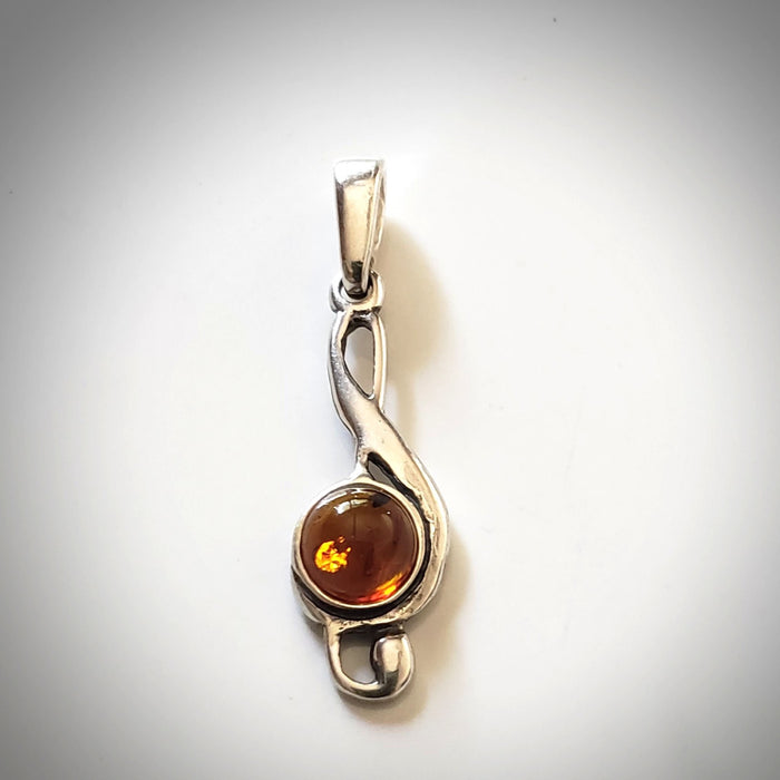 silver musical pendant