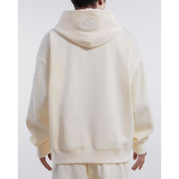 Pro Standard San Francisco 49ers Neutral Drop Shoulder Hoodie in Eggshell color, featuring team logo, made of premium quality fabric