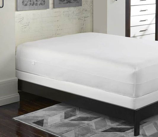 OmniGuard Total Encasement Mattress Protector by PureCare in bed