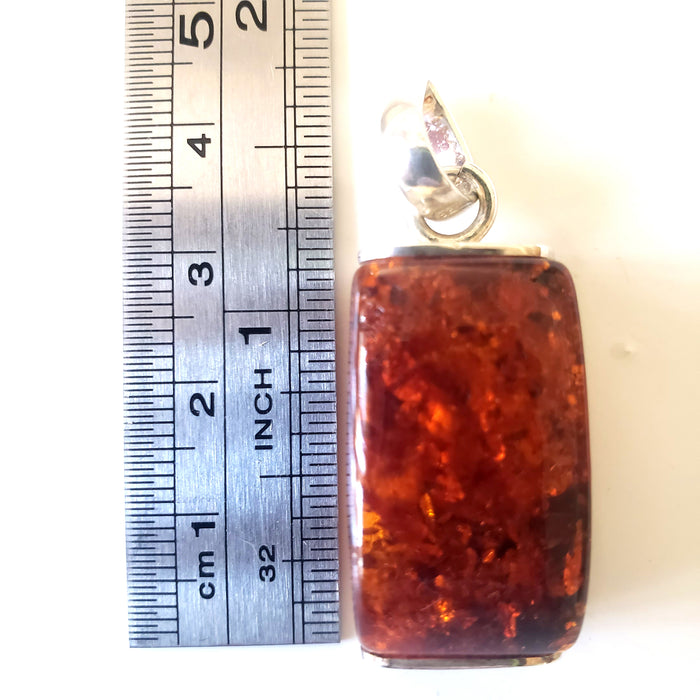 Rectangular cognac amber pendant in sterling silver frame