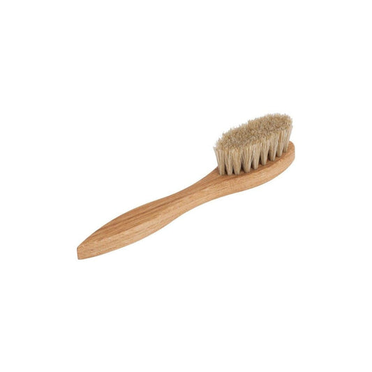 Wooden shoe polish applicator brush with natural bristles on white background