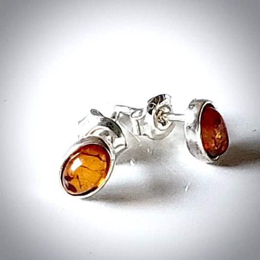 Small amber sterling silver stud earrings