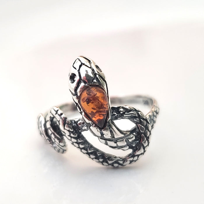 silver snake with natural amber ring