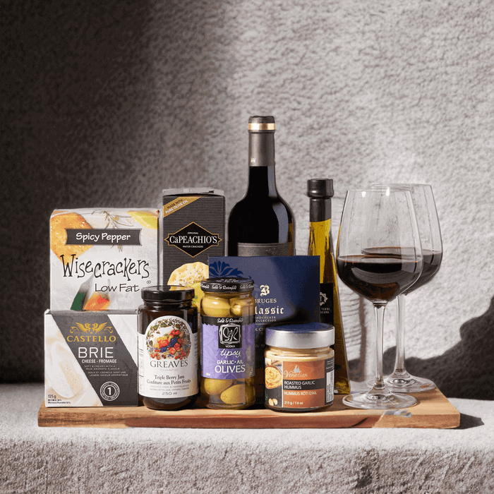 The Complete Wine Gift Basket. Complete with rich hummus, smooth gourmet cheese, crackers, chocolate, garlic olives, fine wine, and so much more,