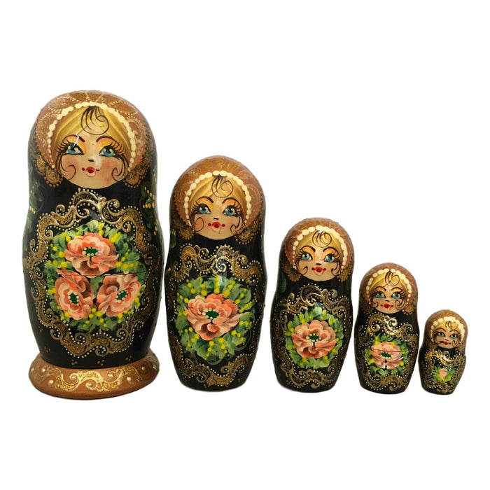 Traditional black pink nesting dolls