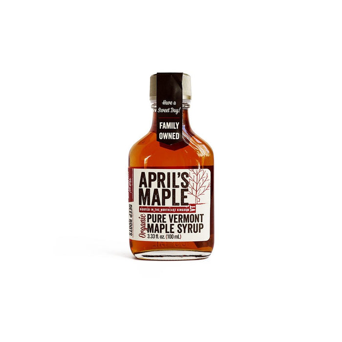 Small glass flask of April's Maple Vermont maple syrup.